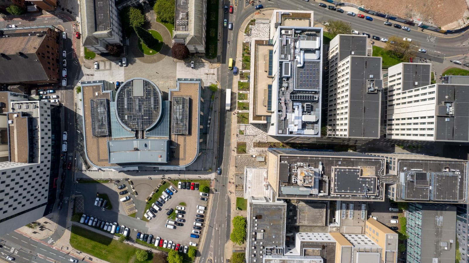UK commercial building with rooftop solar and a finance proposal on the desk